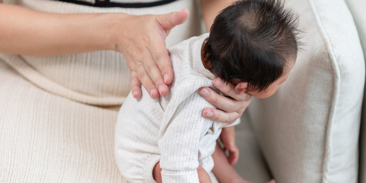 How to Burp a Baby: Positions, Technique, and Timing